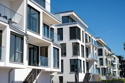 Modern white co-op townhouses 